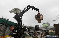 당진 고물상서 굴착기 집게 돌연 추락... 60대 중국인 근로자 현장서 참변