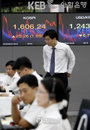 1600선 안착한 24일 코스피 ‘바쁜 외환 딜러 손길’