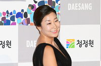 [JK포토]창룡영화제 참석한 라미란 '감초 연기자답게 포즈도 코믹하게~'