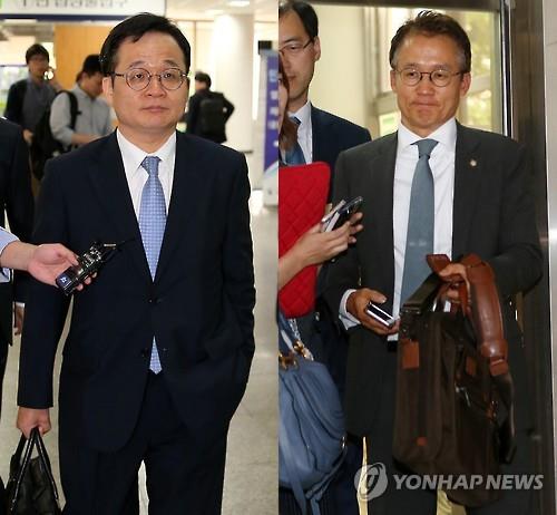 서울중앙지방법원에서 가처분 소송 심문을 마치고 밖으로 나서는 삼성물산 측 김용상 변호사(왼쪽)과 엘리엇의 법률 대리인 최영익 변호사.