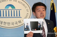 '황제소환' 우병우 사진, 누가 찍었나 했더니
