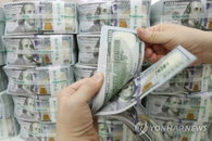 원/달러 환율 1,210원대로 하락…달러인덱스도 하락