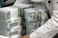 13년만에 최저인 원화 가치 더 떨어진다