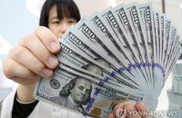 원/달러 환율, 기준금리 인하에 소폭 하락 마감