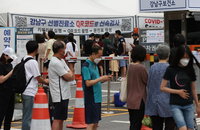 코로나19 신규확진 9만명대 밑으로…금요일 기준 5주만에 최저