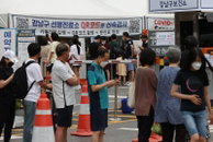 코로나19 신규확진자 5만명대, 사망 60명