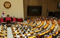 여당 불참 속에 당선된 우원식 국회의장
