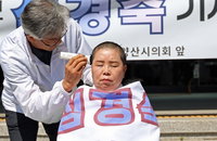 양산시의회 '무투표 당선' 확정에 삭발 항의… 거대 양당 '의석 나눠먹기' 비판 고조